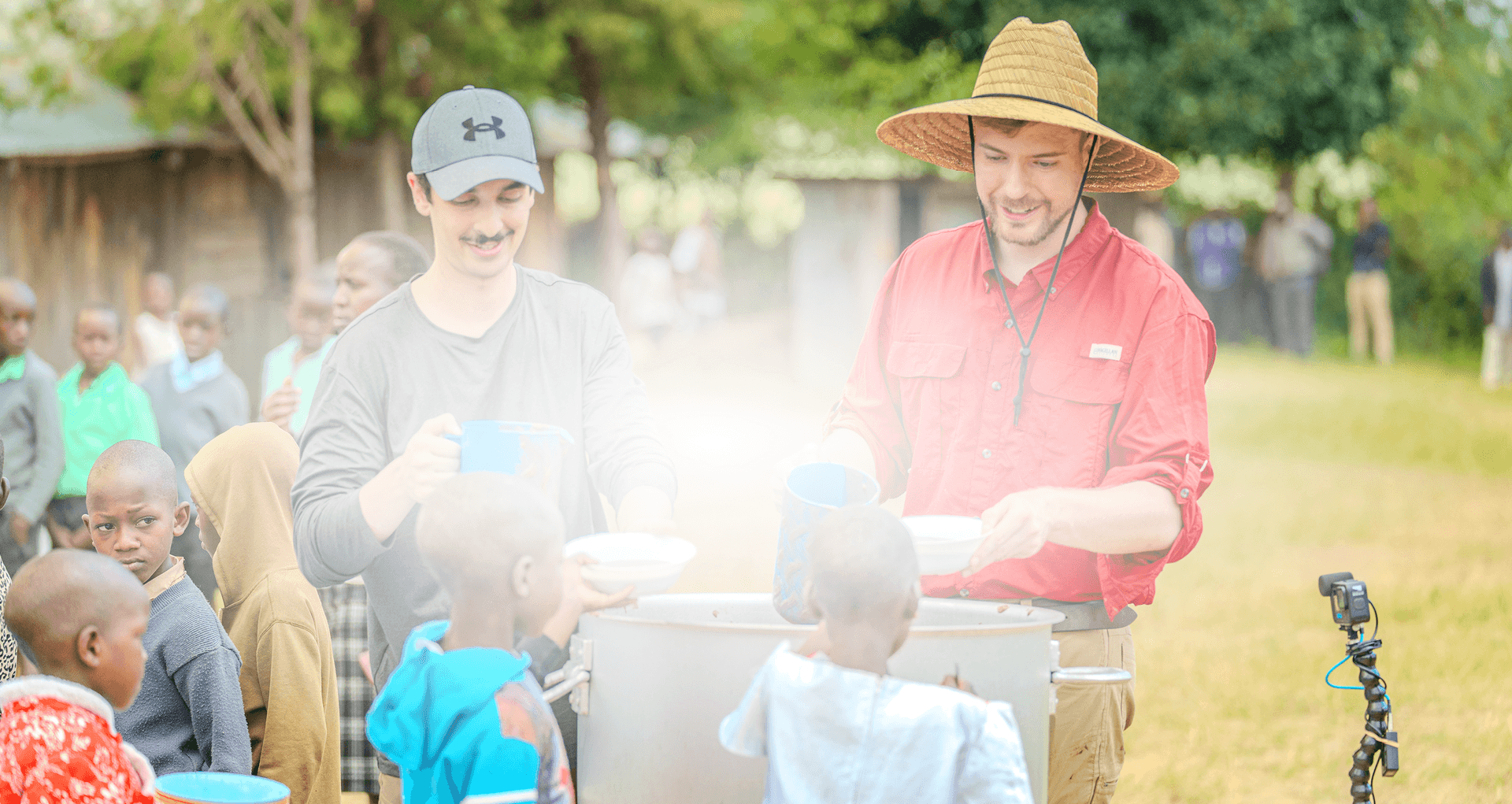 Beast Philanthropy distributing meals in the field